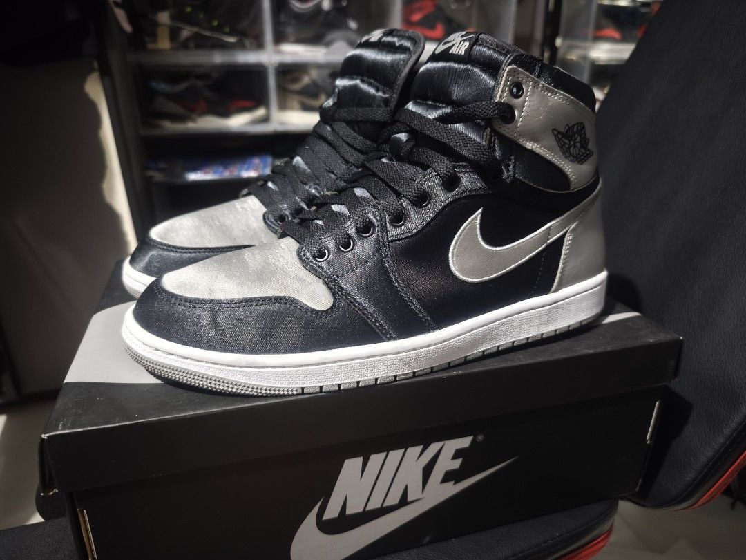 Jordan 1 Retro High OG Satin Shadow (Category: Sneakers) located in Marikina City. Submitted by ahegaosenpai (Listing ID 1465508742, Image 1). Description: - Air Jordan 1 Retro High Satin Shadow - Black and Silver Satin - Size: US 10.5 Men's, US 12 Women's - Includes original box -From Snkrs App -9/10 condition.