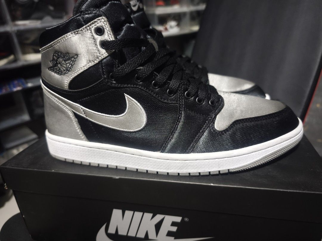 Jordan 1 Retro High OG Satin Shadow (Category: Sneakers) located in Marikina City. Submitted by ahegaosenpai (Listing ID 1465508742, Image 2). Description: - Air Jordan 1 Retro High Satin Shadow - Black and Silver Satin - Size: US 10.5 Men's, US 12 Women's - Includes original box -From Snkrs App -9/10 condition.