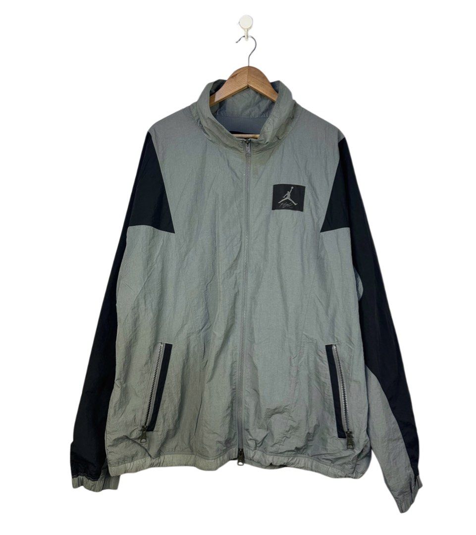 Jordan Flight Track Jacket Grey Black XXL (Category: Coats, Jackets and Outerwear) located in Caloocan City. Submitted by mzcollection_349 (Listing ID 1465402406, Image 1). Description: - Brand: Jordan Flight - Item: Full zip track jacket - Color: Grey body with black sleeves and shoulder panels - Details: Jumpman logo patch, large 'Flight' back print, stand-up collar, dual front zip pockets, inner mesh lining - Fit: Loose fit - Size: XXL - Origi