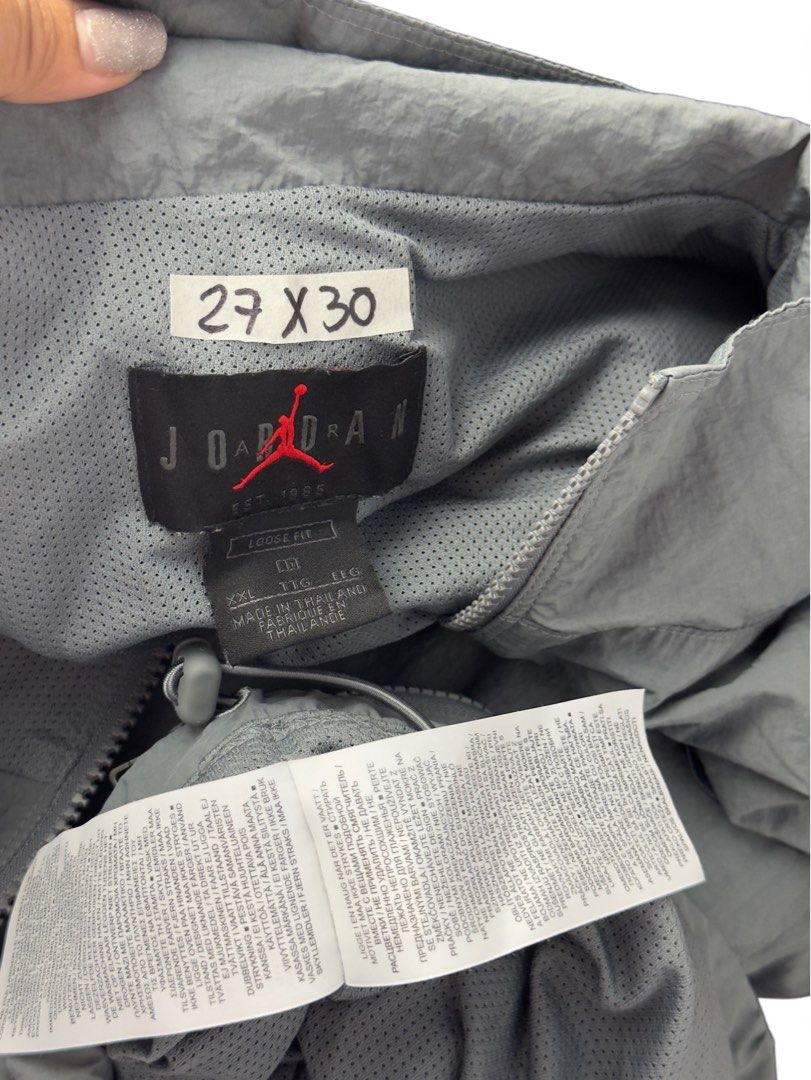 Jordan Flight Track Jacket Grey Black XXL (Category: Coats, Jackets and Outerwear) located in Caloocan City. Submitted by mzcollection_349 (Listing ID 1465402406, Image 3). Description: - Brand: Jordan Flight - Item: Full zip track jacket - Color: Grey body with black sleeves and shoulder panels - Details: Jumpman logo patch, large 'Flight' back print, stand-up collar, dual front zip pockets, inner mesh lining - Fit: Loose fit - Size: XXL - Origi