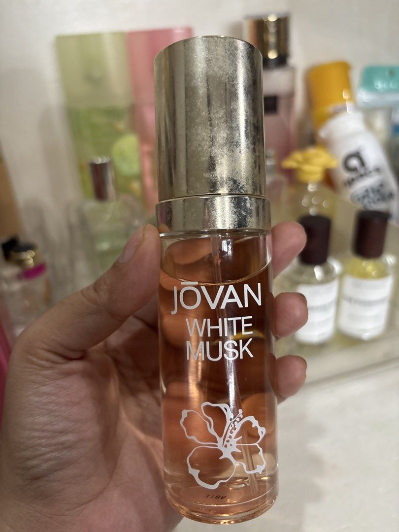 Jovan White Musk Cologne Concentrate 59ml (Category: Fragrance & Deodorants) located in Cabadbaran. Submitted by manualrj2491753 (Listing ID 1465387996, Image 1). Description: - Brand: Jovan White Musk (Original) - Type: Cologne Concentrate - Volume: 2 fl oz / 59 ml, around 90% remaining - Dispenser: Spray nozzle under the cap - Condition: Good fragrance condition; gold-colored cap shows noticeable wear and surface scuffs - Powdery fragrance - RF
