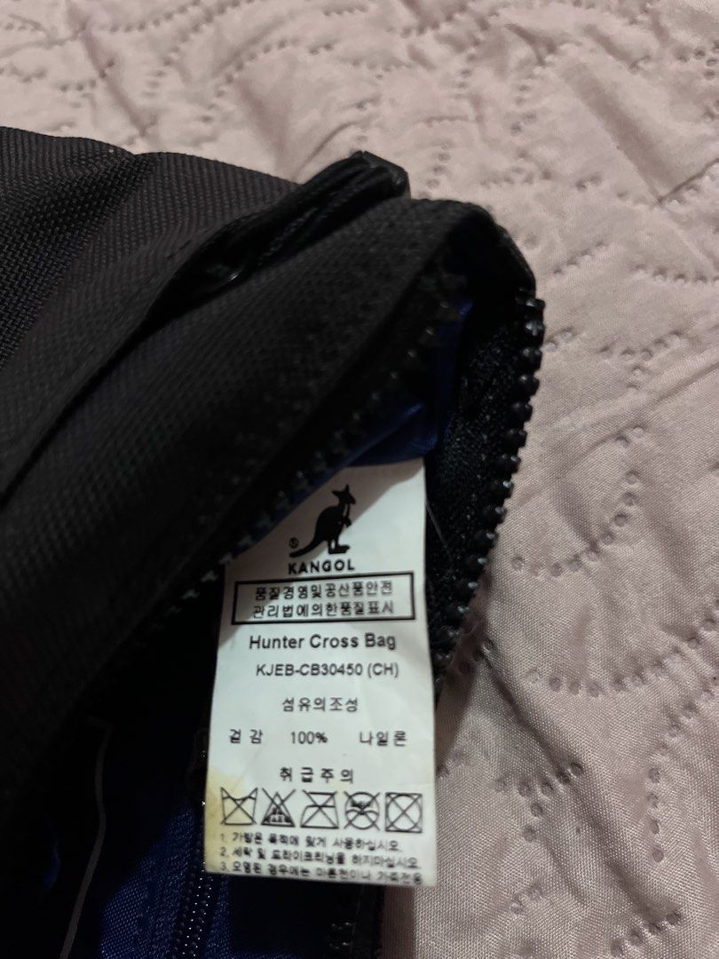 Kangol Cross Body Bag (Category: Cross-body Bags) located in Iloilo. Submitted by trxfinds.ph (Listing ID 1465557126, Image 3). Description: Preloved Kangol crossbody bag ✨ Classic black • Lightweight • Unisex • Perfect for everyday use Condition: Preloved, good condition 10/10 ✔️ Adjustable strap ✔️ Zipper closure ✔️ Spacious enough for your daily essentials .