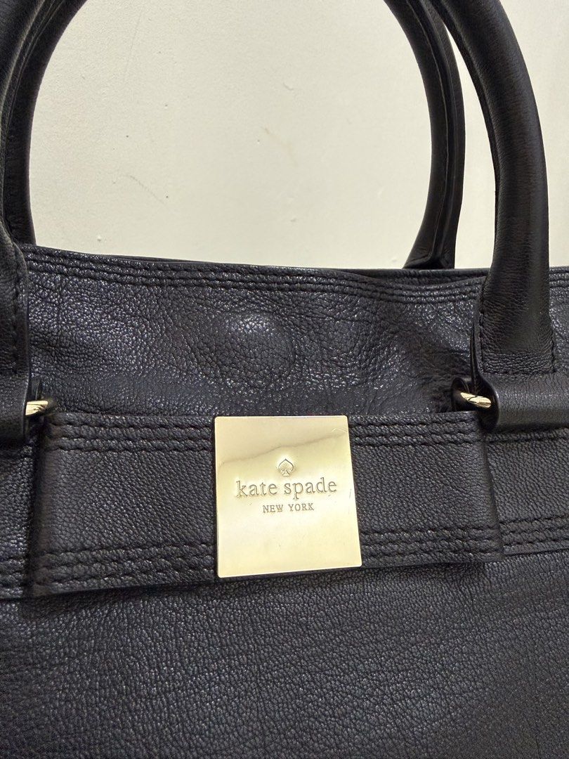 Kate Spade Black Leather Bag with Polka dot Lining (Category: Tote Bags) located in Guagua. Submitted by hampii (Listing ID 1460310267, Image 3). Description: NO ISSUE NO BAKBAK, - Genuine black leather Kate Spade tote bag - Fun polka dot interior lining - Interior zippered pocket - Includes a detachable shoulder strap for versatility - Spacious for all your daily essentials, Ideal for everyday use..