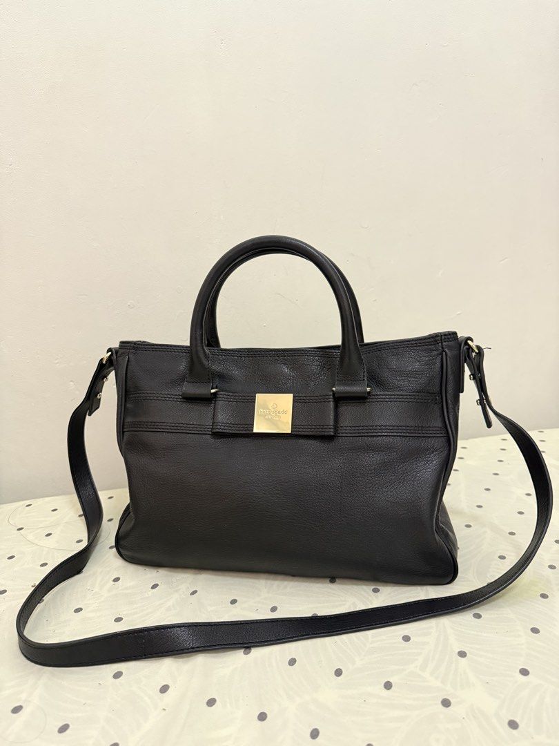 Kate Spade Black Leather Bag with Polka dot Lining (Category: Tote Bags) located in Guagua. Submitted by hampii (Listing ID 1460310267, Image 2). Description: NO ISSUE NO BAKBAK, - Genuine black leather Kate Spade tote bag - Fun polka dot interior lining - Interior zippered pocket - Includes a detachable shoulder strap for versatility - Spacious for all your daily essentials, Ideal for everyday use..