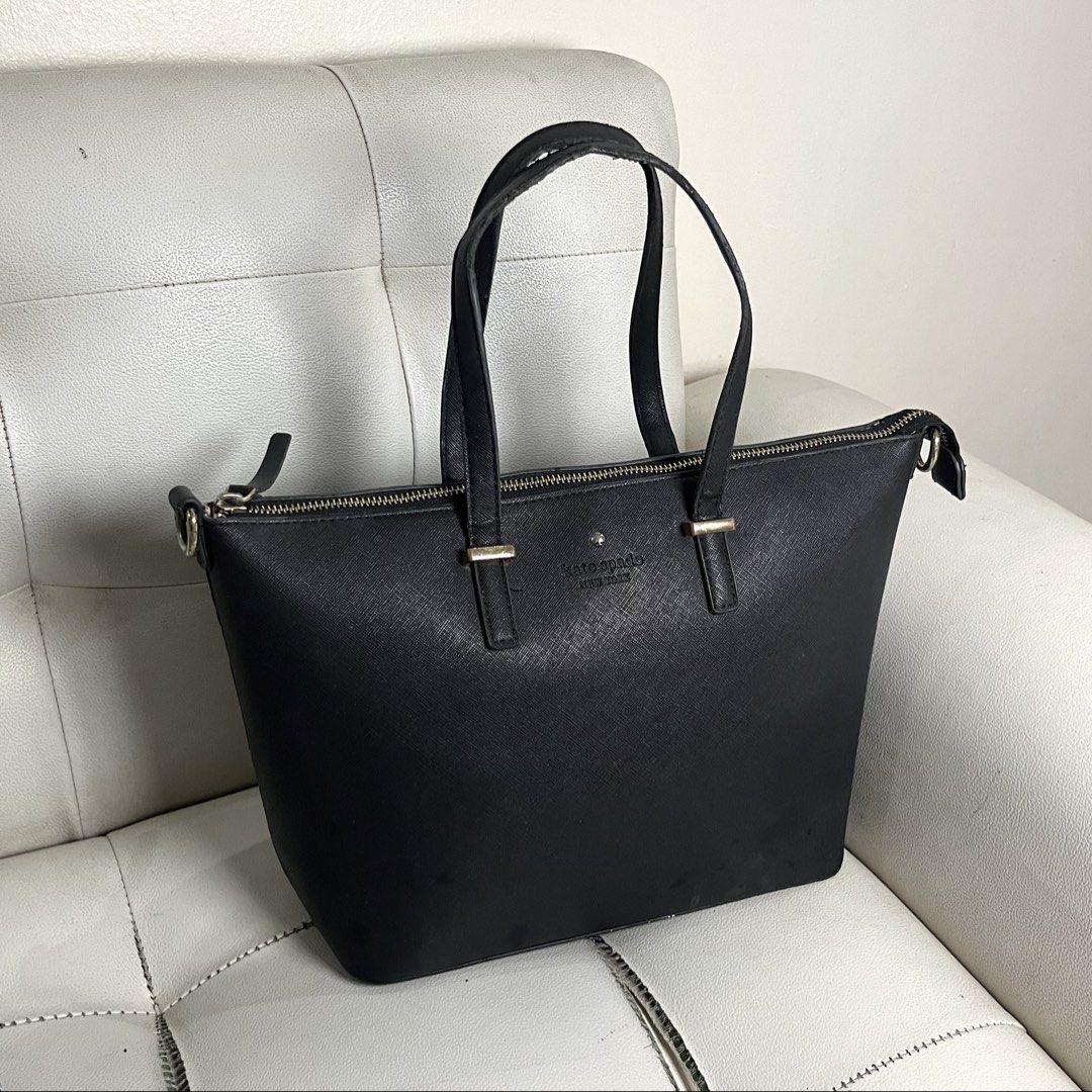 FREE SF |Kate Spade NY Black Saffiano Leather (Category: Shoulder Bags) located in Manila. Submitted by ave.archives (Listing ID 1465444544, Image 1). Description: Auth. Kate Spade NY Black Saffiano Leather. Small-Medium sized compartment. Can be used both for school & casual work / events. Condition & Issues: Flaws on handles only. Interior and exterior (body) are both well-kept and maintained. Zippers & linings complete and intact. All details 