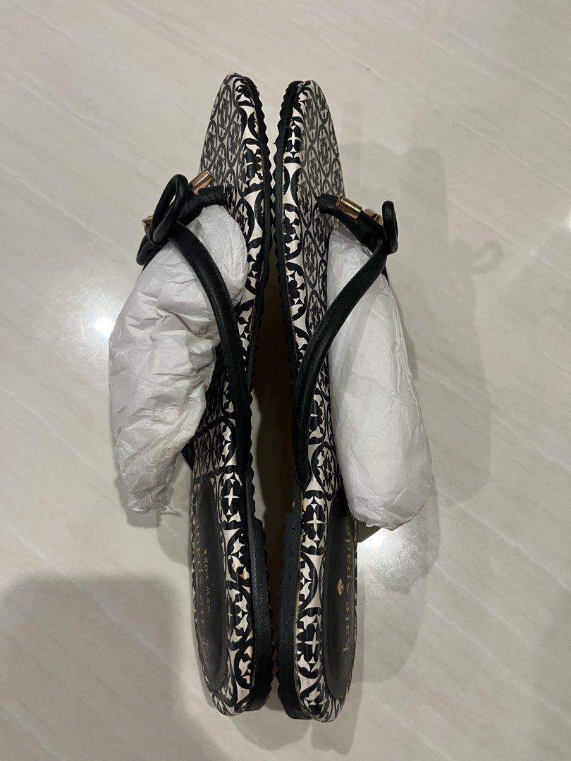 Kate Spade Toe-Post Flat sandals (Category: Flats & Sandals) located in Muntinlupa City. Submitted by jane226ph (Listing ID 1465498532, Image 3). Description: Original and Authentic Charming Kate Spade piece. Like New Signature printed footbed with bow detailing. Kept in storage and never used Upper and straps remain in good condition. Original outsole replaced with a brand new outsole due to deterioration from storage. Purchased in-store Sold as