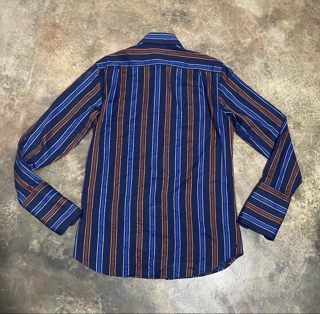 Kenzo vintage longsleeve (Category: Formal Shirts) located in Davao. Submitted by mj_designervintagecurator (Listing ID 1465468441, Image 2). Description: 📌signs of used only 📌best fit med to semi large 📌shoulder 16- bust 41 - armpit 20 - length 31 inches.