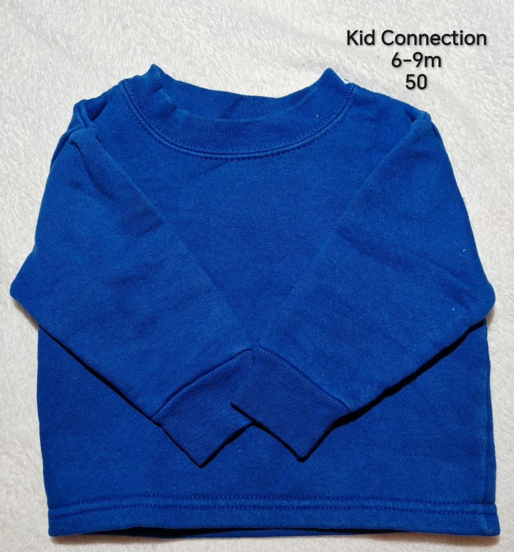 Kid Connection Blue Sweatshirt 6-9m (Category: Babies & Kids Fashion) located in Quezon City. Submitted by maypamor (Listing ID 1465465934, Image 1). Description: - Brand: Kid Connection - Size: Fits 6-9 months - Color: Solid royal blue - Material: Thick, warm cotton - Features: Long sleeves, ribbed collar, cuffs, and hem - Condition: Clean, no stains or damage *Preloved Clothes not from Ukay Location Quezon City Shipping: Lalamove & Jnt.