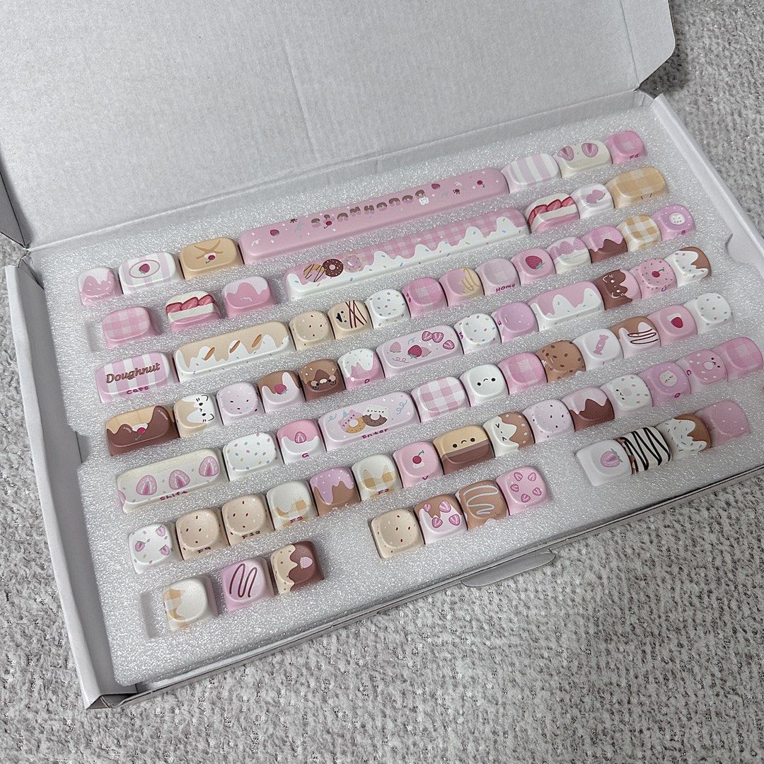 KiiBOOM MOA Dough Fluff Keycaps Set (Category: Computer Keyboard) located in Paranaque City. Submitted by hershey_august (Listing ID 1465399902, Image 1). Description: - Brand new, never used KiiBOOM Dough Fluff mechanical keyboard keycaps - Adorable sweet treats theme with strawberries, donuts, ice cream, and bear graphics - Aesthetic pink, brown, and cream color palette - Complete layout stored safely in original foam tray - Comes with original
