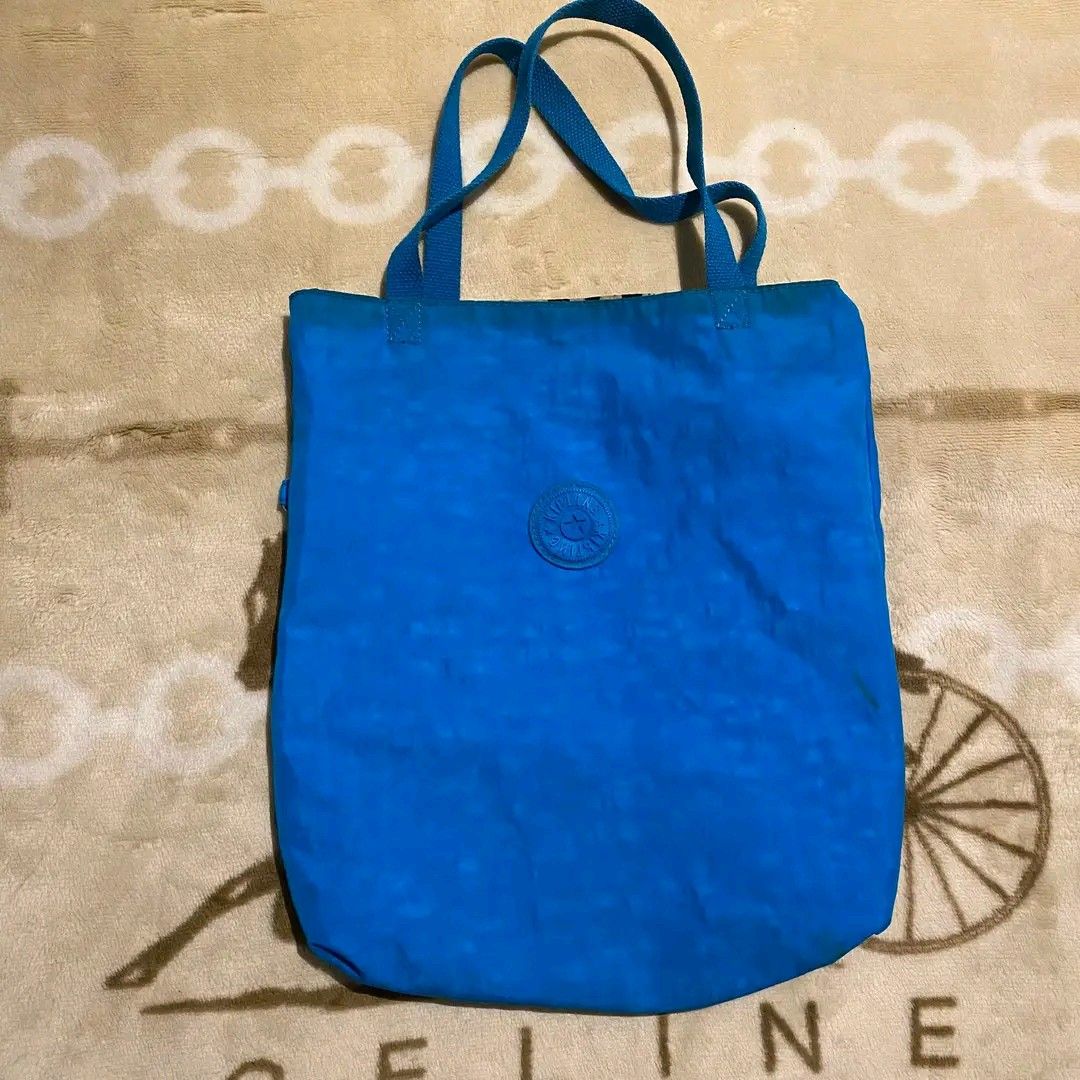 Kipling Reversable Totebag (Category: Tote Bags) located in Manila. Submitted by bidgeyow20688 (Listing ID 1465499006, Image 2). Description: good condition issue stain/needwash size M.