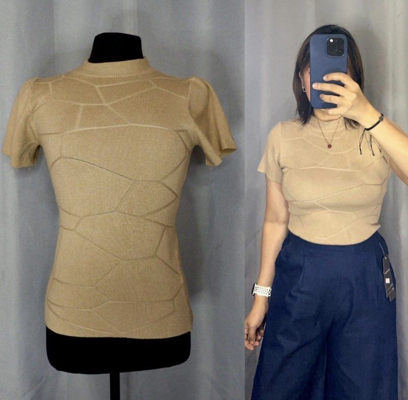 Knit Mock Neck Short Sleeve Top (Category: Blouses) located in Cainta. Submitted by vestito_bestida (Listing ID 1465475125, Image 2). Description: ⛔️ACTUAL PHOTO POSTED⛔️ 👉 Brandnew 👉 BKK 👉 Size: Free size 👉 Top length: 20" 👉 Full length 👉 Color: neutral beige 👉 Soft knit fabric with subtle geometric texture (front and back) 👉 Mock neckline, short sleeves, fitted 👉 Flatlay measured using medida 👉 Actual photo posted. 👉 No filter. Color