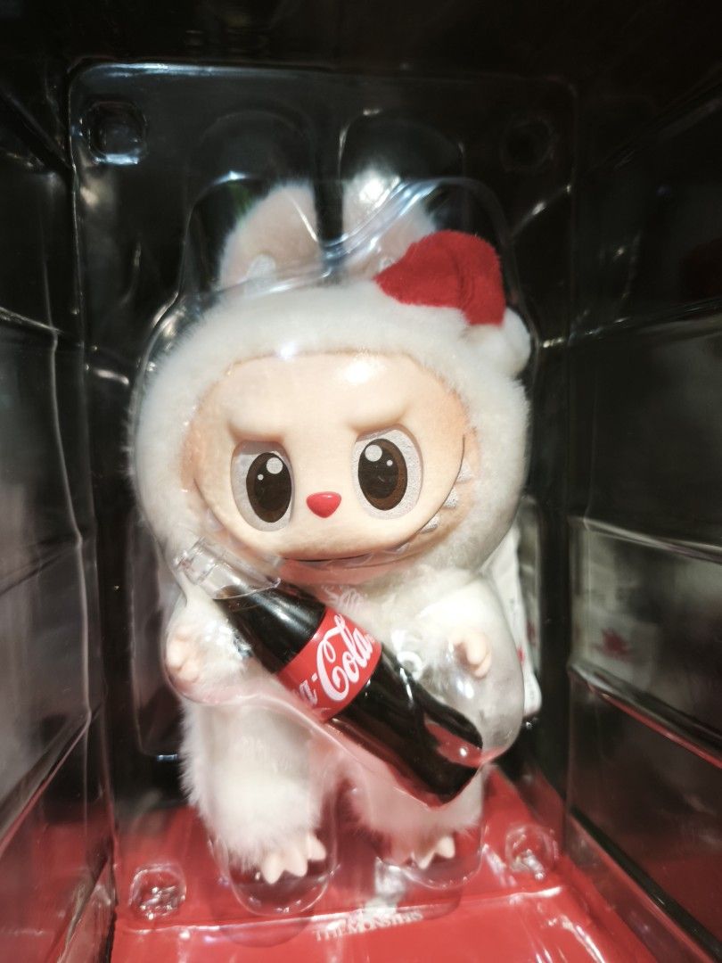 Labubu Coca Cola (Category: Designer & Blind Box Toys) located in Dumangas. Submitted by reyah00 (Listing ID 1465502539, Image 3). Description: The Monsters x Coca Cola The Monsters Vinyl Face (Labubu ⭐Happy Factor 1/2 ⭐Surprise Shake 1/2 Unsealed (Complete with Card) Mint Box (Good as new) Preferably sold as a bundle. DM for the more details & price. 📍Iloilo City 🚛 JnT.
