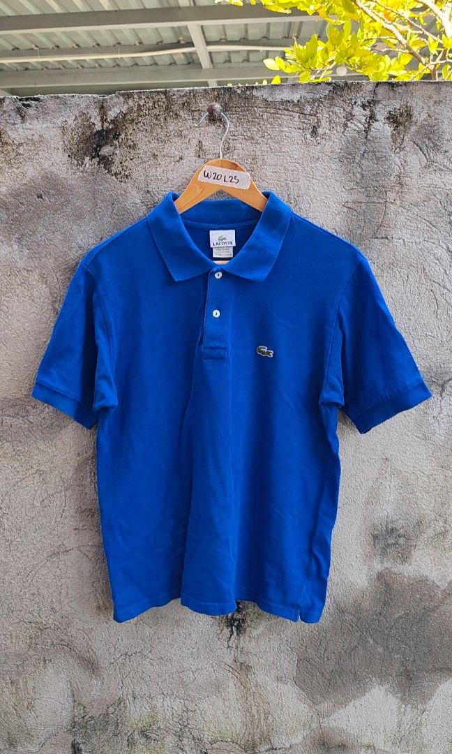 Lacoste Blue Poloshirt (Category: Activewear) located in Villasis. Submitted by znivvthrift (Listing ID 1465447121, Image 1). Description: Asnew condition.