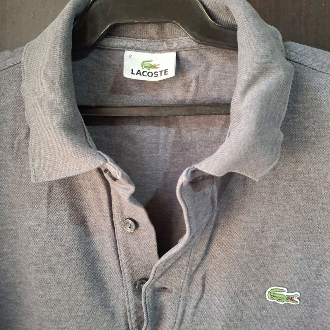 Lacoste Grey Polo Shirt (Category: Others Tops) located in Caloocan City. Submitted by mei56313 (Listing ID 1465387144, Image 3). Description: - preloved grey Lacoste polo shirt for women/men - size 2 (XS for men) - for women, fits S to M - excellent condition, no issues.