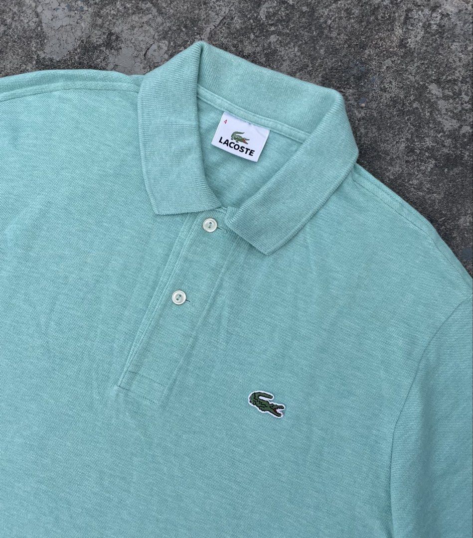 Lacoste Mint Green Polo Shirt Size 4 Devanlay (Category: Tshirts & Polo Shirts ) located in Manila. Submitted by ajzeemlimbamidzid (Listing ID 1465512196, Image 2). Description: - Brand: Lacoste (Manufactured by Devanlay) - Size: 4 - Color: Mint Green - Material: 100% Premium Cotton - Origin: Made in Tunisia - Design: Classic collar, two-button placket, signature embroidered green crocodile logo - Perfect for smart-casual wear, office, or weekend