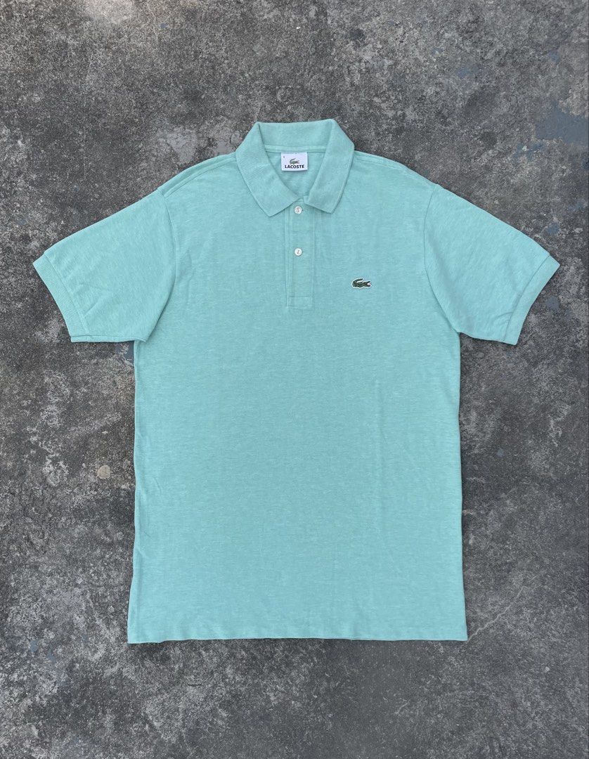 Lacoste Mint Green Polo Shirt Size 4 Devanlay (Category: Tshirts & Polo Shirts ) located in Manila. Submitted by ajzeemlimbamidzid (Listing ID 1465512196, Image 1). Description: - Brand: Lacoste (Manufactured by Devanlay) - Size: 4 - Color: Mint Green - Material: 100% Premium Cotton - Origin: Made in Tunisia - Design: Classic collar, two-button placket, signature embroidered green crocodile logo - Perfect for smart-casual wear, office, or weekend