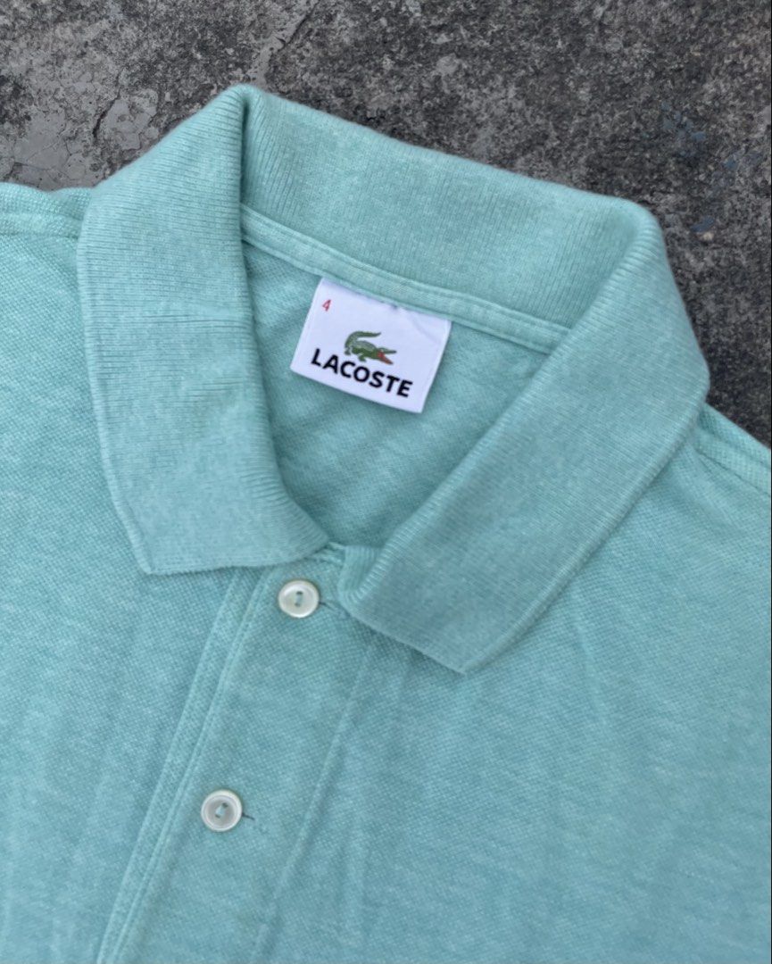 Lacoste Mint Green Polo Shirt Size 4 Devanlay (Category: Tshirts & Polo Shirts ) located in Manila. Submitted by ajzeemlimbamidzid (Listing ID 1465512196, Image 3). Description: - Brand: Lacoste (Manufactured by Devanlay) - Size: 4 - Color: Mint Green - Material: 100% Premium Cotton - Origin: Made in Tunisia - Design: Classic collar, two-button placket, signature embroidered green crocodile logo - Perfect for smart-casual wear, office, or weekend