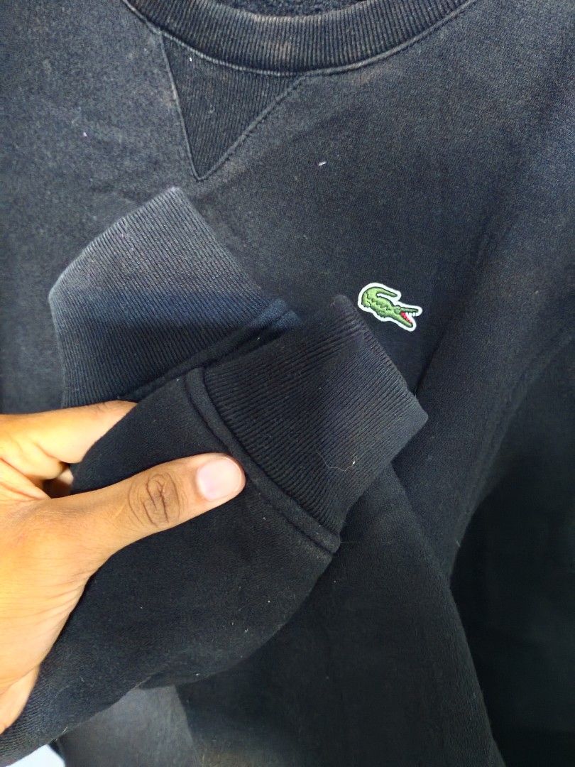Lacoste Sport Black Sweatshirt (Category: Coats, Jackets and Outerwear) located in General Santos City (Dadiangas). Submitted by rexthegreat (Listing ID 1465425829, Image 3). Description: - Brand: Lacoste Sport - Item: Crewneck Sweatshirt - Color: Black with blue/white interior neck tape - Size: US Small (S) - Material: Standard cotton fleece - Details: Iconic embroidered crocodile logo on chest, ribbed V-inset at collar, cuffs, and hem - Origin: