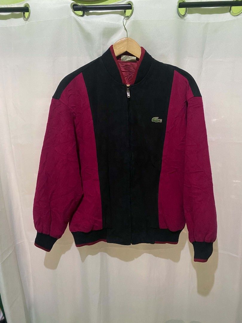 Lacoste Vintage Colorblocked Bomber Jacket (Category: Coats, Jackets and Outerwear) located in Quezon City. Submitted by elihur.tuazon (Listing ID 1465481667, Image 3). Description: - Brand: Lacoste - Style: Colorblock bomber jacket (Black & Burgundy) - Details: Full zip closure, embroidered chest crocodile logo, matching maroon inner lining - Fit/Cut: Classic vintage cut with ribbed collar, cuffs, and hem - Origin: Korean tag inside collar.