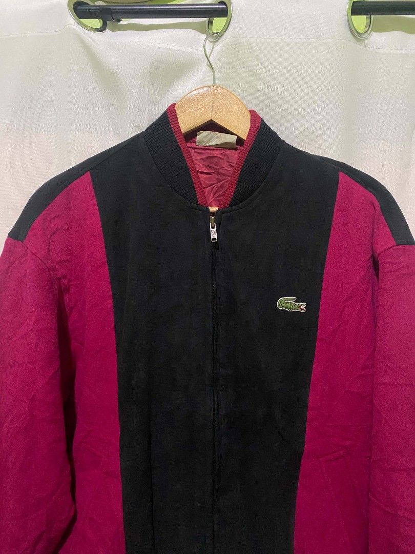 Lacoste Vintage Colorblocked Bomber Jacket (Category: Coats, Jackets and Outerwear) located in Quezon City. Submitted by elihur.tuazon (Listing ID 1465481667, Image 1). Description: - Brand: Lacoste - Style: Colorblock bomber jacket (Black & Burgundy) - Details: Full zip closure, embroidered chest crocodile logo, matching maroon inner lining - Fit/Cut: Classic vintage cut with ribbed collar, cuffs, and hem - Origin: Korean tag inside collar.