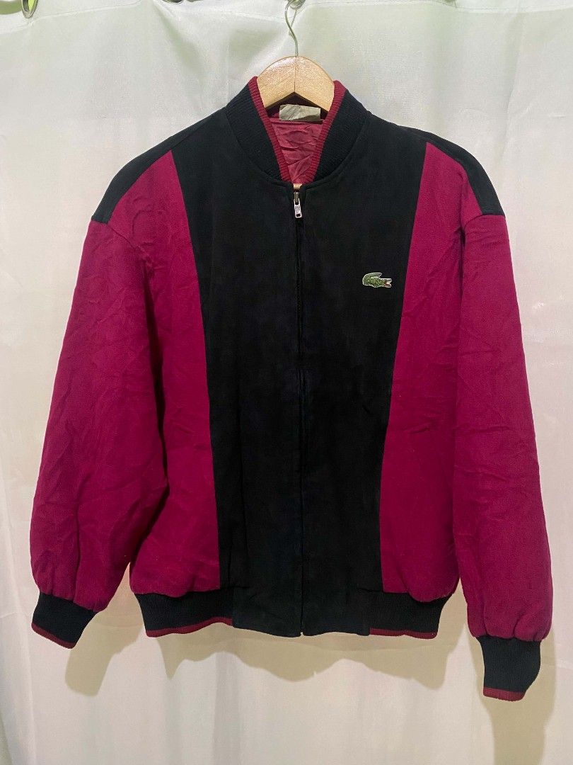 Lacoste Vintage Colorblocked Bomber Jacket (Category: Coats, Jackets and Outerwear) located in Quezon City. Submitted by elihur.tuazon (Listing ID 1465481667, Image 2). Description: - Brand: Lacoste - Style: Colorblock bomber jacket (Black & Burgundy) - Details: Full zip closure, embroidered chest crocodile logo, matching maroon inner lining - Fit/Cut: Classic vintage cut with ribbed collar, cuffs, and hem - Origin: Korean tag inside collar.