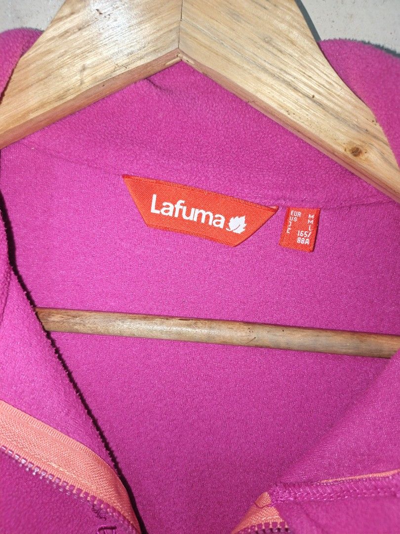 Lafuma pink quarter-zip fleece jacket size M (Category: Coats, Jackets and Outerwear) located in Saravia. Submitted by foundandfavedbcd (Listing ID 1465533697, Image 2). Description: - Brand: Lafuma - Color: Pink with light pink trim - Size: M (Tag) - Material: Cozy fleece - Features: Quarter-zip closure, high collar, logo graphic on sleeve, and branded text on zipper - Condition: Great pre-loved condition - Origin: Made in Indonesia.