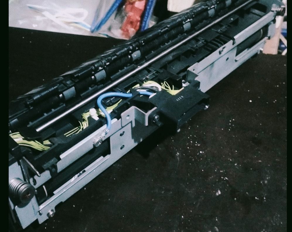 Laser Printer Fuser Assembly Heater Unit Replacement (Category: Printers, Scanners & Copiers) located in Caloocan City. Submitted by copiermach60483 (Listing ID 1465531969, Image 1). Description: - Genuine printer fuser unit replacement part - Heavy-duty metal and plastic construction with wiring harness and rollers - Pulled from a working office machine - Features clean gear assembly and intact electrical connector ports - Normal cosmetic wear o