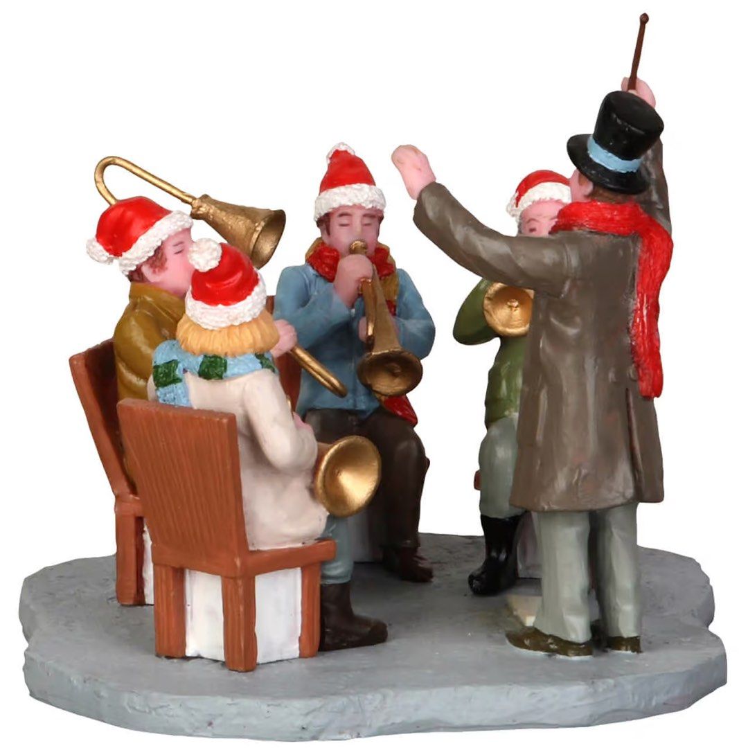 Lemax Gazebo Band (Category: Figurines & Statues) located in Santiago. Submitted by kitalpanga (Listing ID 1465414473, Image 2). Description: - Brand: Lemax (Item #33034) - Set: Christmas Carols miniature figures with brass instruments, conductor in top hat, and performance sign - Packaging: Original blister packaging included - Ideal for: Holiday village displays and Christmas collections - Condition: Excellent collectible item.