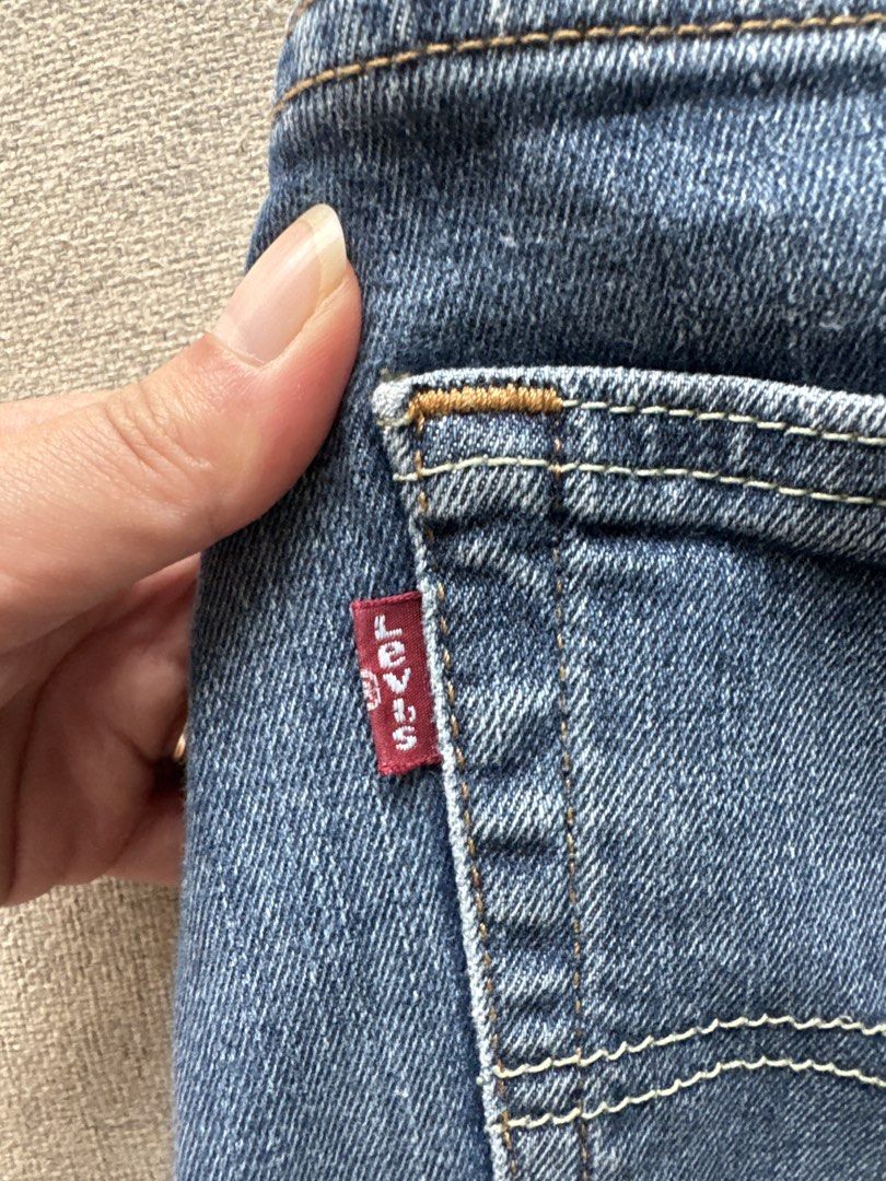 Levi's 505 Jeans (Category: Jeans) located in Makati City. Submitted by sabmi (Listing ID 1465446195, Image 3). Description: - Brand/Model: Levi's 505 Straight Fit Jeans - Wash: Classic medium blue with light fading on thighs - Size: Waist 32, Length 30 (W32 L30) - Details: Standard 5-pocket styling, zip fly with button closure - Branding: Signature leather patch on back waistband and red tab on back pocket - Material: Sturdy, durable denim fabri