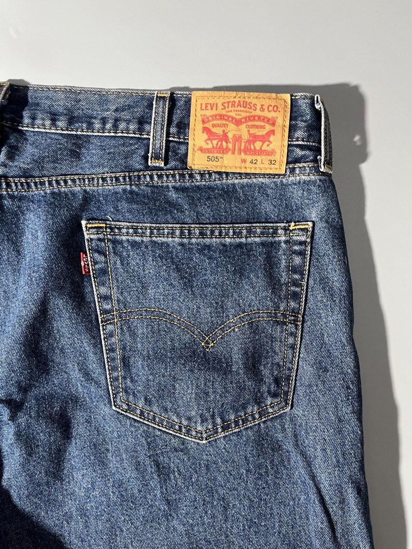 Levi's 505 Regular Fit Jeans W42 L32 (Category: Jeans) located in Quezon City. Submitted by curatedandholygrails (Listing ID 1465548535, Image 1). Description: - Brand/Model: Levi's 505 Regular Fit Jeans - Size: W42 L32 - Color/Wash: Medium Blue - Fit: Classic straight leg throughout - Details: Five-pocket design, zip fly with button closure, iconic red tab, and leather back waistband patch - Origin: Made in Lesotho - 9/10 Condition: Clean stitch