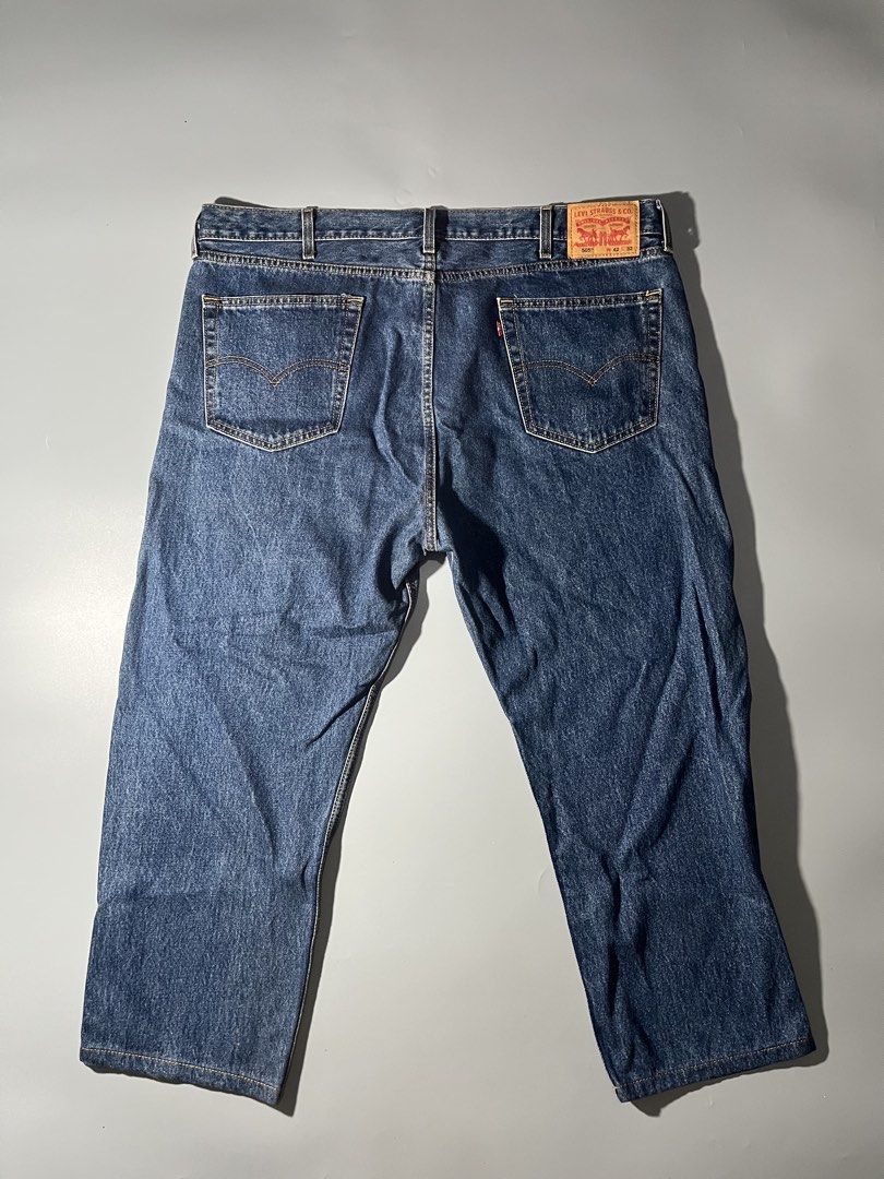 Levi's 505 Regular Fit Jeans W42 L32 (Category: Jeans) located in Quezon City. Submitted by curatedandholygrails (Listing ID 1465548535, Image 2). Description: - Brand/Model: Levi's 505 Regular Fit Jeans - Size: W42 L32 - Color/Wash: Medium Blue - Fit: Classic straight leg throughout - Details: Five-pocket design, zip fly with button closure, iconic red tab, and leather back waistband patch - Origin: Made in Lesotho - 9/10 Condition: Clean stitch
