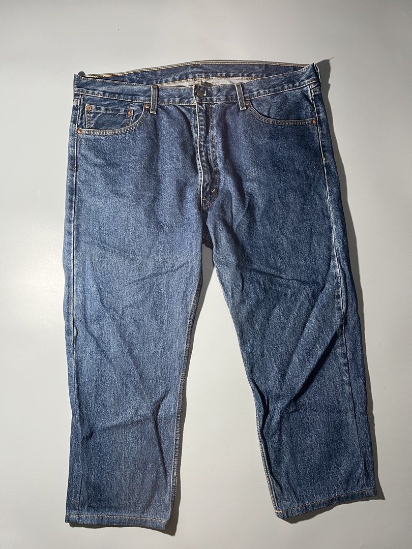 Levi's 505 Regular Fit Jeans W42 L32 (Category: Jeans) located in Quezon City. Submitted by curatedandholygrails (Listing ID 1465548535, Image 3). Description: - Brand/Model: Levi's 505 Regular Fit Jeans - Size: W42 L32 - Color/Wash: Medium Blue - Fit: Classic straight leg throughout - Details: Five-pocket design, zip fly with button closure, iconic red tab, and leather back waistband patch - Origin: Made in Lesotho - 9/10 Condition: Clean stitch