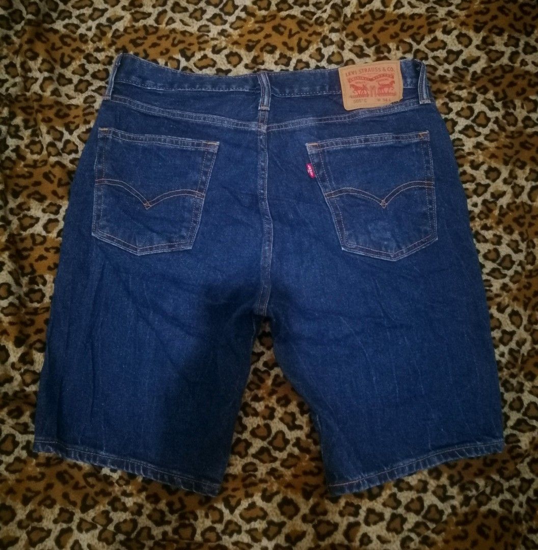 Levi's Dark Blue Denim Shorts (Category: Shorts) located in Cebu City. Submitted by roadthrift (Listing ID 1465401635, Image 3). Description: - Brand: Levi's - Color: Dark blue denim - Fit: Standard fit - Details: Classic five-pocket design with button fly - Material: Sturdy denim fabric - Condition: Great for casual everyday wear in warmer weather - Origin: Made in China - W34-36 x L20.5.