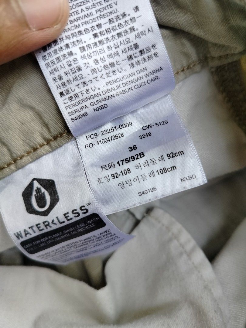 Levi's Khaki Cargo Shorts Size 36 (Category: Shorts) located in Manila. Submitted by gerald_quinto (Listing ID 1465482784, Image 3). Description: - Brand: Levi's - Color: Khaki - Size: 36 - Style: Classic utility cargo shorts - Closure: Button closure with zip fly - Pockets: Multiple functional pockets on sides and back - Waistband: Standard belt loops - Sustainability: Features Waterless manufacturing tag.