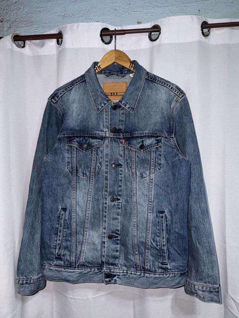 LEVIS TRUCKER DENIM JACKET levis premium white tag (Category: Activewear) located in Manila. Submitted by triptothrift7 (Listing ID 1465571247, Image 1). Description: pm me for fast transaction! LEVIS TRUCKER DENIM JACKET levis premium white tag for only 1800 size large on tag width 22 x 27 length minor issue need wash check pictures excellent condition color rate 9/10 authentic legit mode of payment gcash or bank transfer location Biñan laguna.