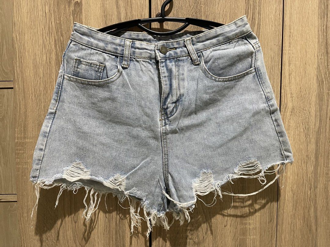 Light wash denim cutoff shorts (Category: Shorts) located in Manila. Submitted by preloveditems_jem (Listing ID 1465473651, Image 3). Description: Super cute light wash denim shorts with a high waist and edgy raw frayed hem. Perfect for summer days. Waist is 30 inches across and length is 12 inches. Grab these before they're gone!.