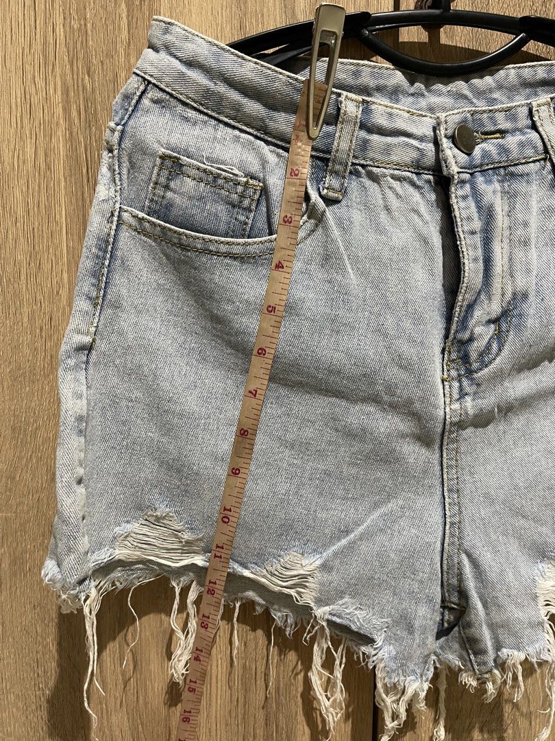 Light wash denim cutoff shorts (Category: Shorts) located in Manila. Submitted by preloveditems_jem (Listing ID 1465473651, Image 2). Description: Super cute light wash denim shorts with a high waist and edgy raw frayed hem. Perfect for summer days. Waist is 30 inches across and length is 12 inches. Grab these before they're gone!.
