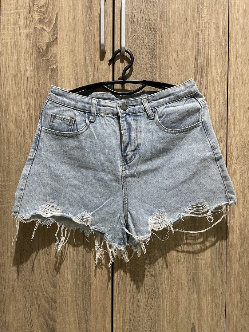 Light wash denim cutoff shorts (Category: Shorts) located in Manila. Submitted by preloveditems_jem (Listing ID 1465473651, Image 1). Description: Super cute light wash denim shorts with a high waist and edgy raw frayed hem. Perfect for summer days. Waist is 30 inches across and length is 12 inches. Grab these before they're gone!.