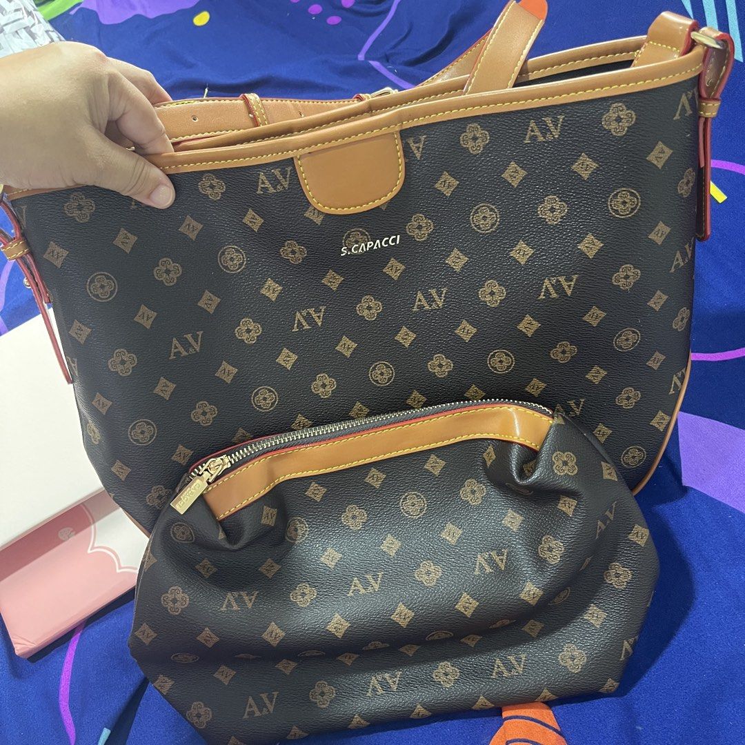 Like new Capacci Leather Open Shoulder Bag (Category: Cross-body Bags) located in Binangonan. Submitted by messymeshyshop (Listing ID 1465470661, Image 1). Description: Capacci Leather Semi- Large Shoulder Bag with Pouch Location: Binangonan, Rizal Mop: GCash Shipping: FREE via Spx.