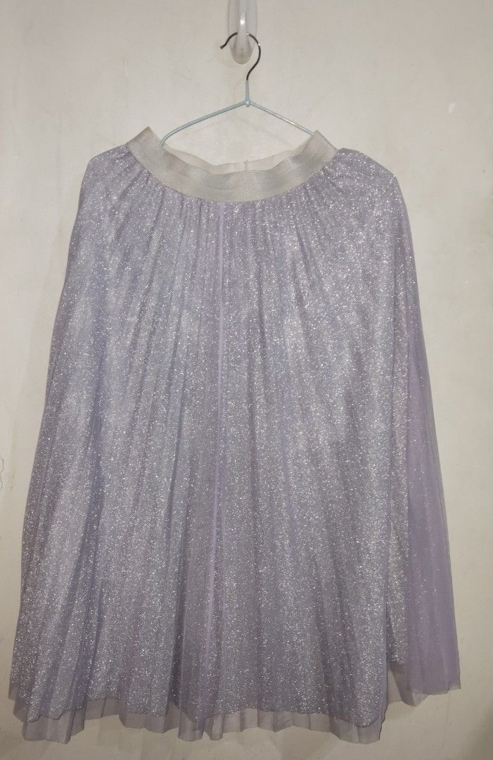 Lilac purple glitter skirt (Category: Skirts) located in Cebu City. Submitted by zealhorse.812446 (Listing ID 1465564419, Image 1). Description: Glittery layer with purple tulle.