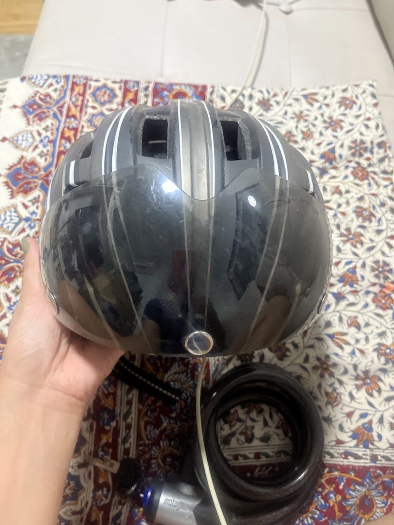 Lixada Cycling Helmet with Detachable Visor (Category: Bicycles) located in Pasig City. Submitted by jnzmrq1003 (Listing ID 1465519721, Image 3). Description: - Brand: Lixada - Color: Black and grey with white stripes - Includes a tinted magnetic detachable visor - Excellent ventilation with multiple top and side air vents - Adjustable straps with reflective details for night safety - Perfect for road cycling and daily commuting - Condition: Exce