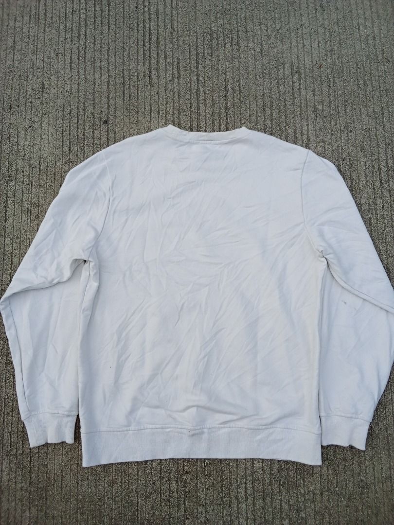 Loewe White Embroidered Logo Sweatshirt (Category: Luxury Apparel) located in Caloocan City. Submitted by mysticdog-6a6b (Listing ID 1465447930, Image 3). Description: - Brand: Loewe - Color: White with embroidered black lettering - Size: XL but fit to large - Material: 100% Cotton (Made in Portugal) - Style: Crewneck with ribbed cuffs and hem - Condition: Good, with minor yellowing near the collar from previous wear - Authentic luxury piece read