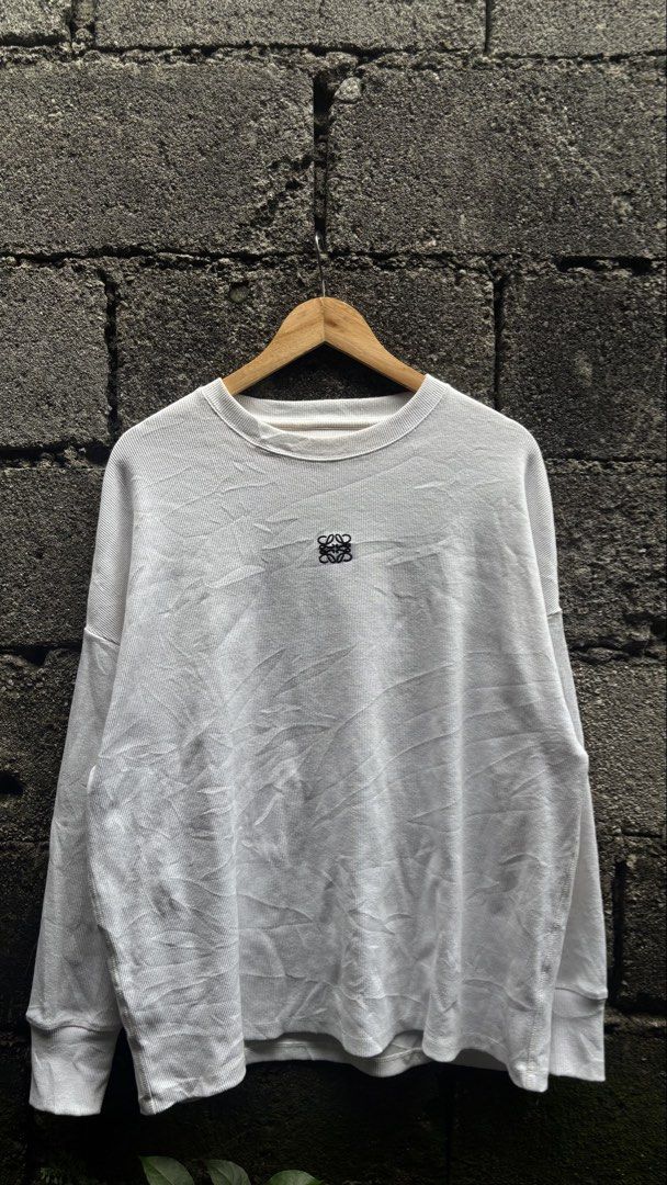 Loewe White Middle Chest Logo Drop-Shoulder Longsleeve (Category: Luxury Apparel) located in Quezon City. Submitted by erodinamict (Listing ID 1465435673, Image 2). Description: Size:L-XL Good condition color rate: 9/10 dimes:26x28.