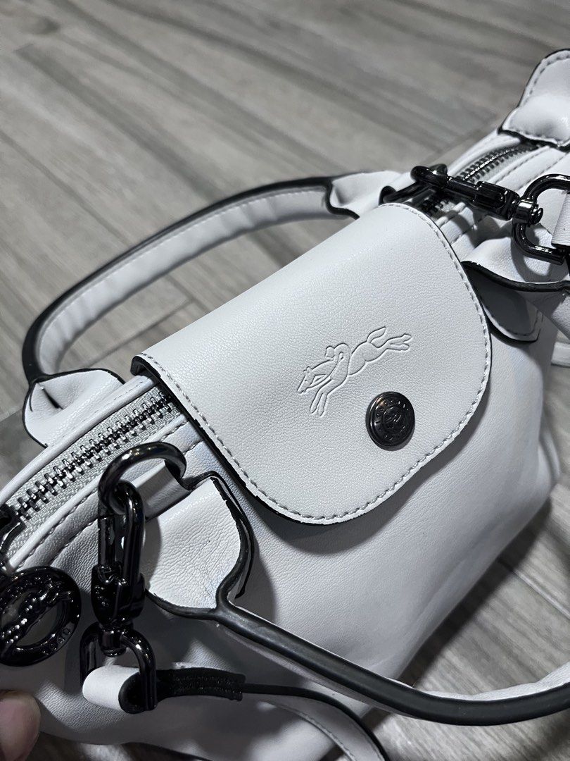 Longchamp (Category: Cross-body Bags) located in Dagupan City. Submitted by calmocean-f675cc (Listing ID 1465507921, Image 3). Description: Longchamp Mate in france No issue Excellent 999 only add sf .
