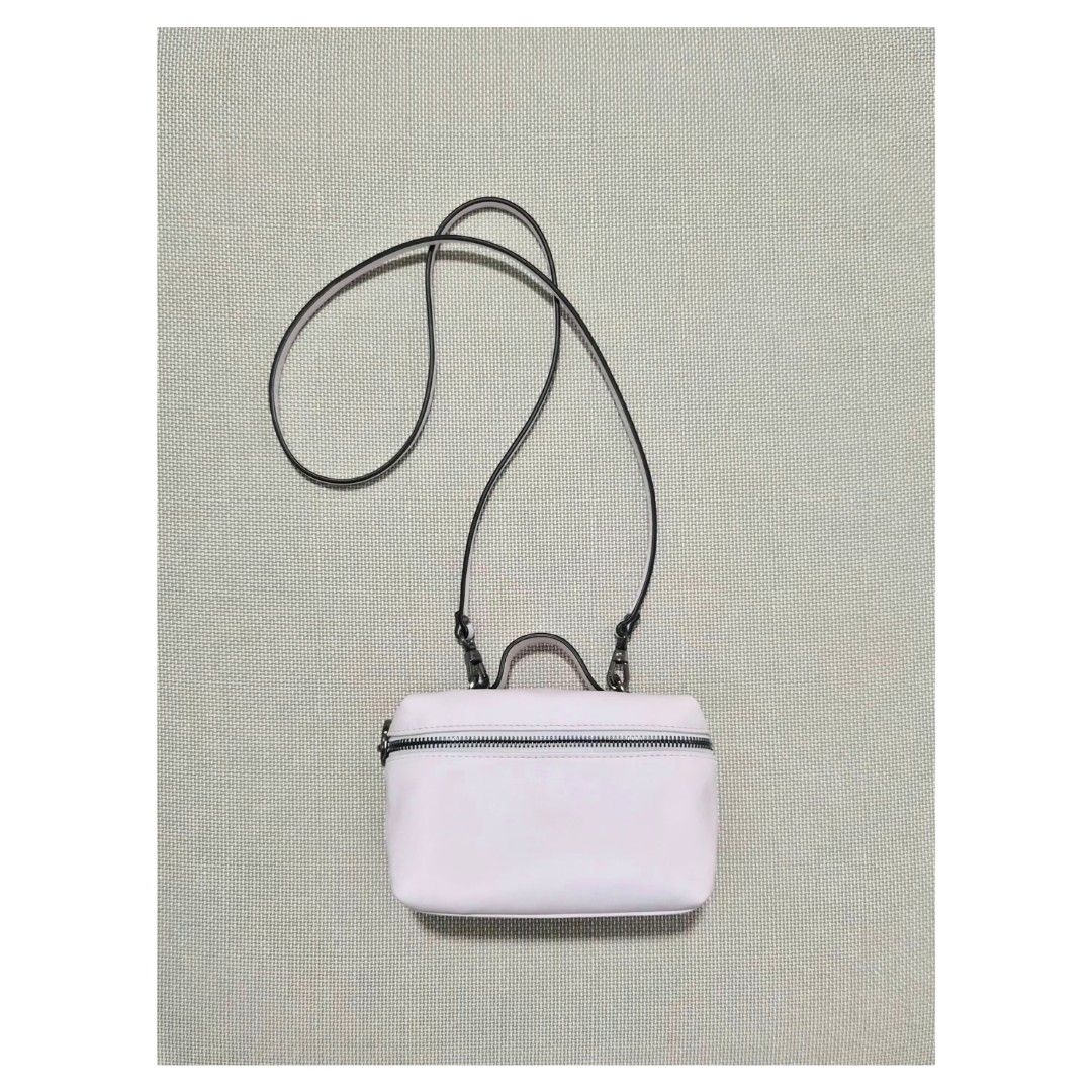 Longchamp Xtra Vanity XS (Category: Luxury Bags & Wallets) located in Bacoor. Submitted by _sysells (Listing ID 1423350458, Image 1). Description: Le Pliage Xtra XS Vanity Pink - Leather. Purchased from Rustan's last year. Has a minor scratch as shown in the 4th photo. Inclusions: dust bag and care card. Zip closure Detachable shoulder strap 1 inside flat pocket RFS: Downsizing my bag collection..