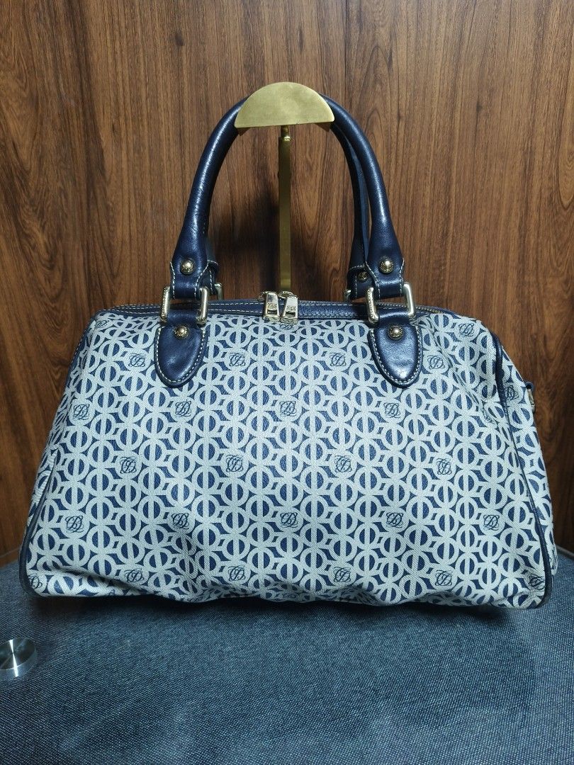 LOUIS QUATORZE Monogram Boston Satchel Bag (Category: Tote Bags) located in Baguio. Submitted by PreiLoveMaria (Listing ID 1465513774, Image 2). Description: LOUIS QUATORZE Monogram Boston Satchel Bag ​Elevate your everyday style with this classy and sophisticated piece from Louis Quatorze! A timeless structured satchel that effortlessly transitions from day to night. Good used condition with normal signs of wear (please review all photos for exa