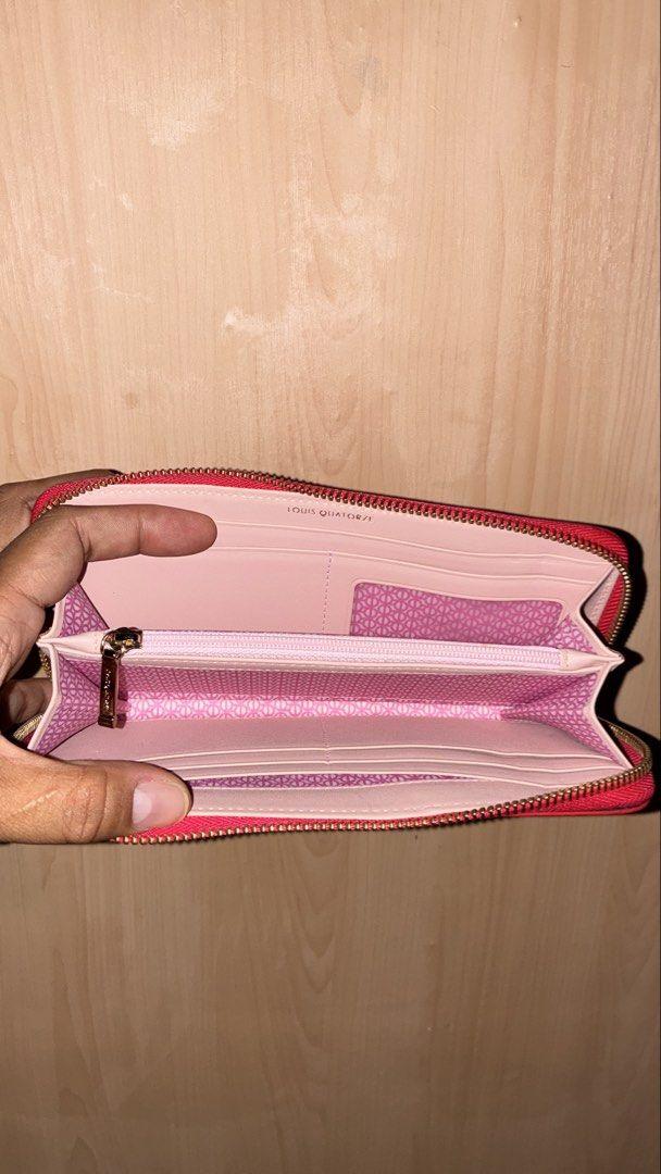 Louis Quatorze Red Zip Around Wallet with Studs (Category: Wallets & Card holders) located in Placer. Submitted by talaalond61563 (Listing ID 1465424849, Image 2). Description: - Brand: Louis Quatorze - Color: Bright red exterior with soft pink interior - Hardware: Gold-tone - Design: Zip-around wallet with front studded logo in metallic beads - Interior: Multiple card slots, slip pockets, and a central zippered coin compartment - Size: Compact a