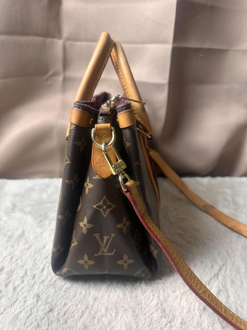 Louis Vuitton Monogram Canvas Tote Handbag with Strap (Category: Luxury Bags & Wallets) located in Davao. Submitted by luckyturtle.aa6ccf (Listing ID 1465392955, Image 3). Description: - Authentic Louis Vuitton Monogram Canvas Tote Bag - Brown coated canvas with classic vachetta leather trim - Dual top handles and adjustable shoulder strap with gold-tone metal hardware - Burgundy interior lining featuring a convenient central zipped compartment -