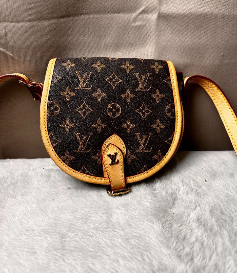 Louis Vuitton Monogram Canvas Saddle Bag Crossbody (Category: Luxury Bags & Wallets) located in Davao. Submitted by luckyturtle.aa6ccf (Listing ID 1465455851, Image 2). Description: - Authentic Louis Vuitton Monogram Saddle Bag - Classic monogram canvas with Vachetta leather trim - Secure flap closure with stylish buckle detail - Vibrant red interior lining with a convenient slip pocket - Elegant gold-tone hardware throughout - Adjustable shoulde