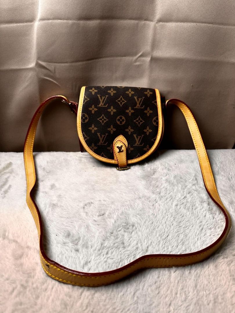 Louis Vuitton Monogram Canvas Saddle Bag Crossbody (Category: Luxury Bags & Wallets) located in Davao. Submitted by luckyturtle.aa6ccf (Listing ID 1465455851, Image 1). Description: - Authentic Louis Vuitton Monogram Saddle Bag - Classic monogram canvas with Vachetta leather trim - Secure flap closure with stylish buckle detail - Vibrant red interior lining with a convenient slip pocket - Elegant gold-tone hardware throughout - Adjustable shoulde